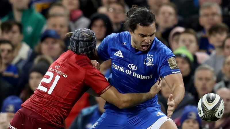 Leinster’s James Lowe in action against Duncan Williams of Munster during the Guinness Pro 14 game at the Aviva stadium. Photograph: Bryan Keane/Inpho
