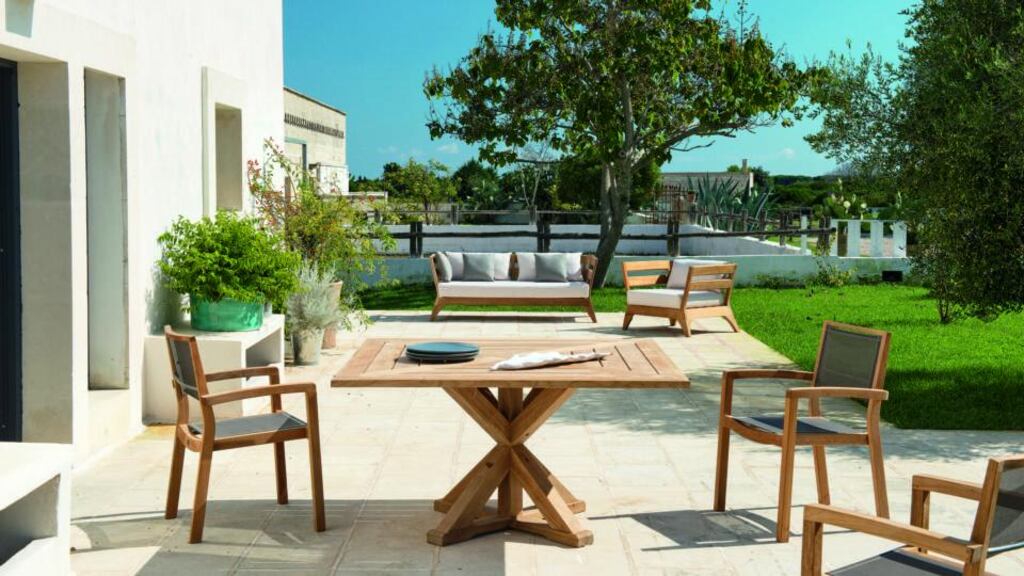 Teak dining table by Italian furniture firm Ethimo