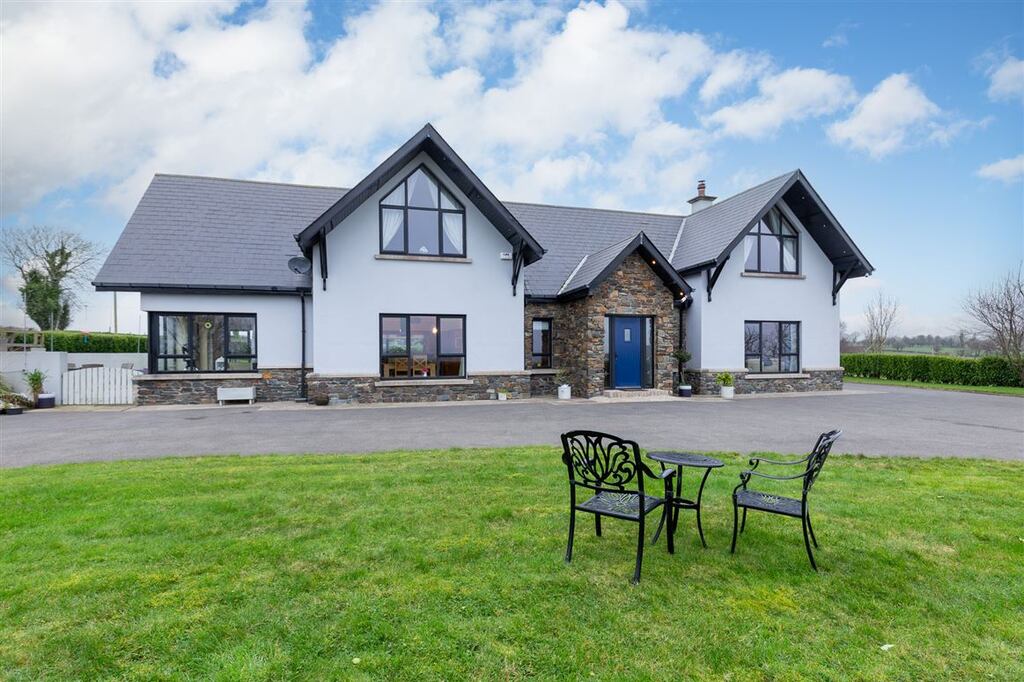 Situated on a site with mature landscaped gardens, the property is less than a 10-minute drive from Gorey