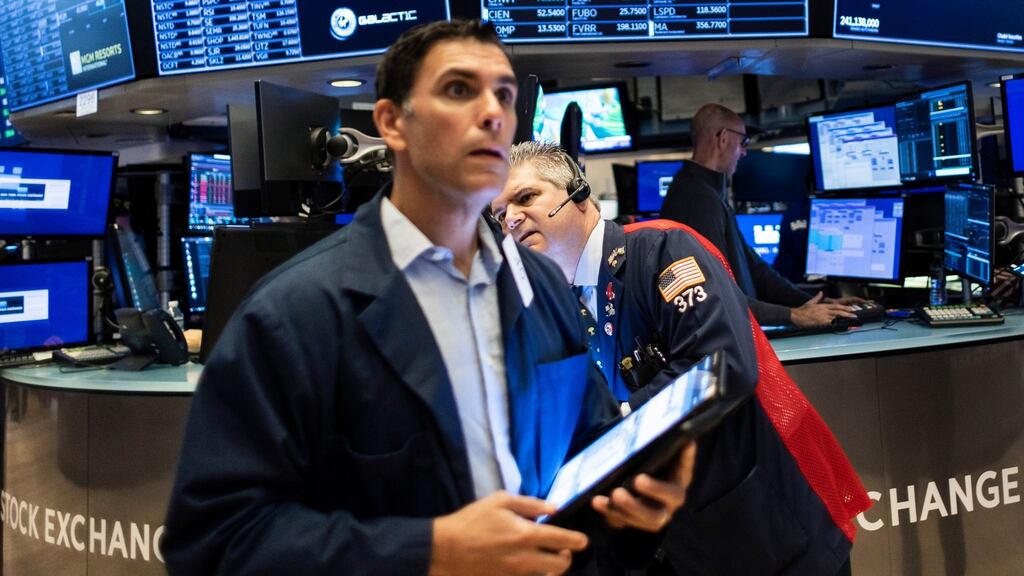 In New York, gains in defensive shares and Boeing helped the Dow and the S&P 500 index recover some lost ground. Photograph: Justin Lane/EPA