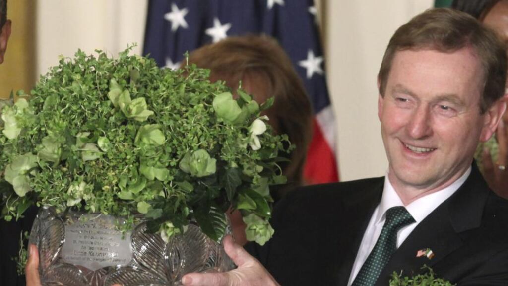 Presenting a bowl of shamrock to the US president at the White House on St Patrick’s Day is an annual tradition. Photograph: Chris Kleponis/Reuters