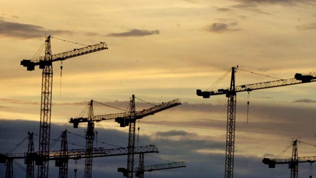 Cranes: an increasingly familiar sight on Dublin’s skyline. Photograph: Dara MacDónaill