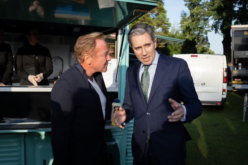 Tánaiste Simon Harris (right) and Michael Flatley at the 4th of July celebrations. Photograph: Dan Dennison