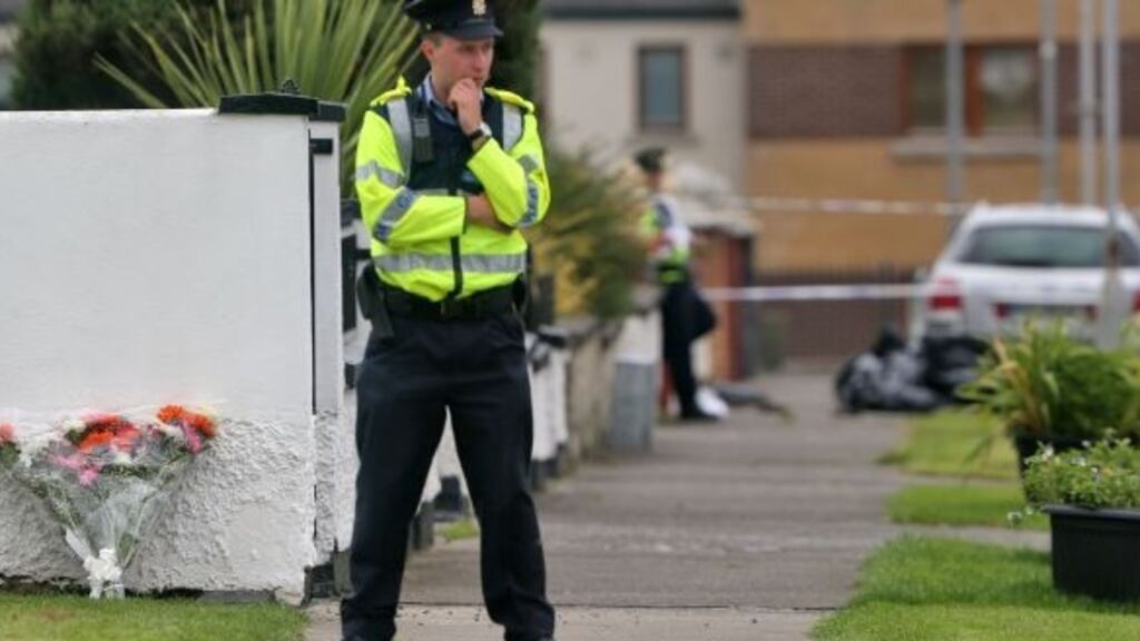 Flowers left near the scene of the double fatal shooting at Balbutcher Drive, Ballymun pictured on Thursday morning. Photograph: Colin Keegan, Collins Dublin