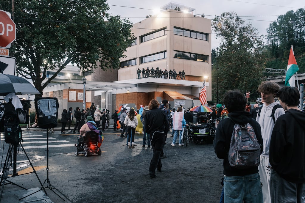 Protesters gather outside an Immigration and Customs Enforcement detention centre in Portland, Oregon, last month. Photograph: Jordan Gale/The New York Times