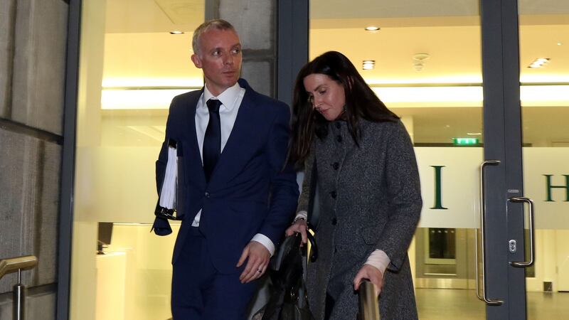 Pharmacist David Murphy with an unidentifed person leaving the Pharmaceutical Society inquiry in Dublin. Photograph: Nick Bradshaw