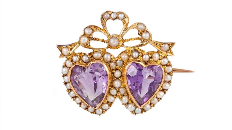 Late Victorian amethyst and seed pearl double heart brooch €450–€550 O’Reilly’s, Frances St. Fine Jewellery Sale.