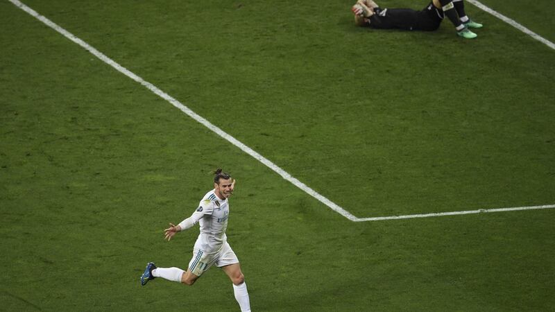 Liverpool’s  goalkeeper Loris Karius lies on the ground after Gareth Bale scored his second goal in the the Champions League final against Liverpool at the NSC Olimpiyskiy stadium in Kiev. Photograph: Sergei Supinsky/AFP/Getty Images