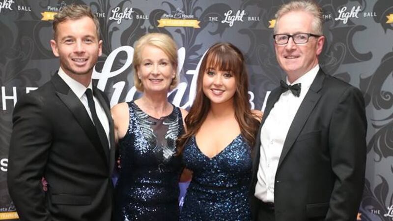 Ali Baker with her femily at the Light Ball, which has raised more than €400,000 in Ireland, Australia, and the UAE for Pieta House and local mental health charities.