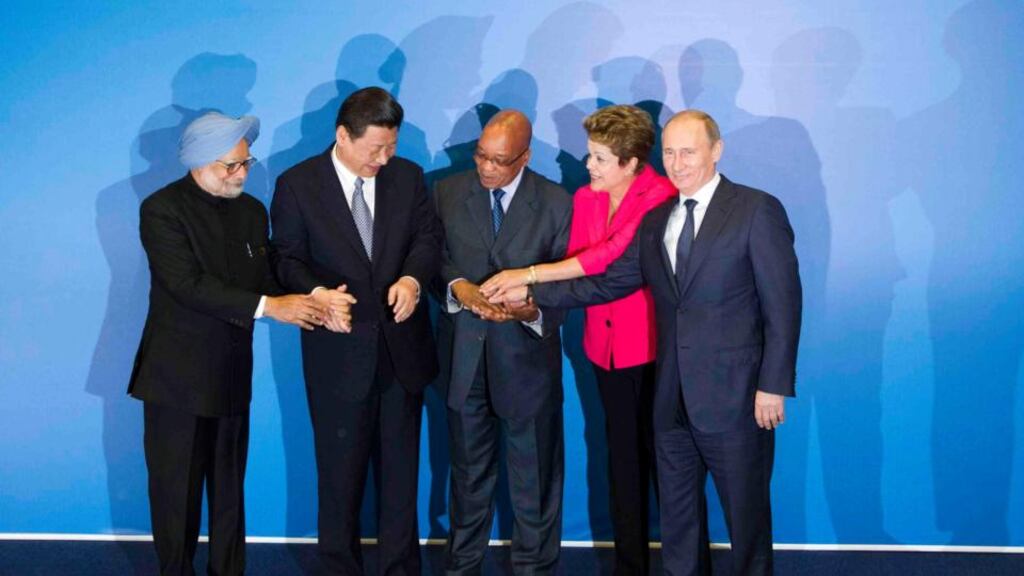 Indian prime minister Manmohan Singh, Chinese president Xi Jinping, South African president Jacob Zuma, Brazilian president Dilma Rousseff and Russian president Vladimir Putin pose during the fifth Brics Summit in Durban. Photograph Rogan Ward/Reuters