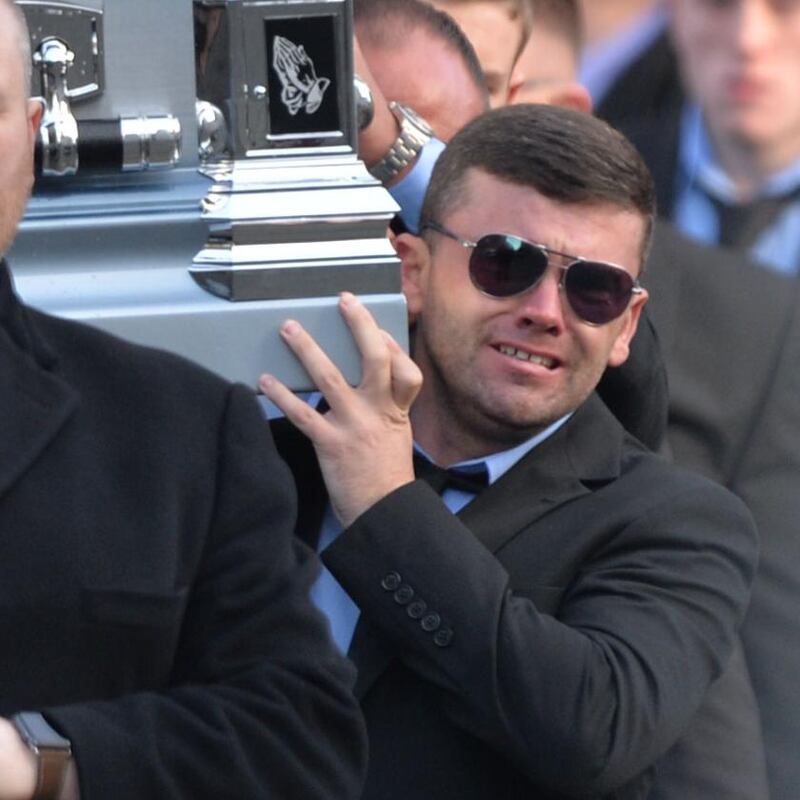 Liam Byrne carrying his brother David’s coffin. Photograph: The Irish Times