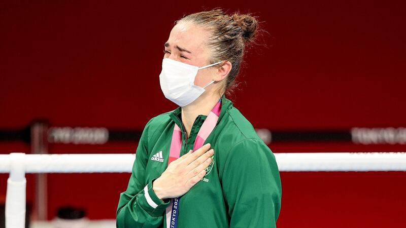Kellie Harrington during the playing of Amhrán na bhFiann at the Kokugikan Arena in Tokyo following her gold medal win. Photograph: Bryan Keane/Inpho