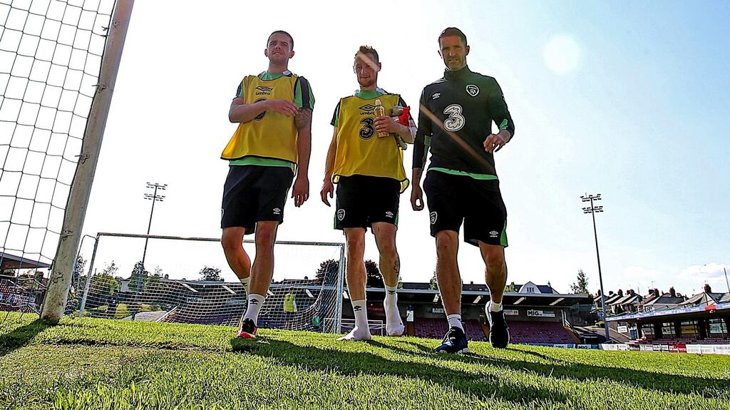 Robbie Brady, Stephen Quinn and Robbie Keane at the Republic of Ireland training session at Turner’s Cross on Monday. Photograph: Donall Farmer/Inpho