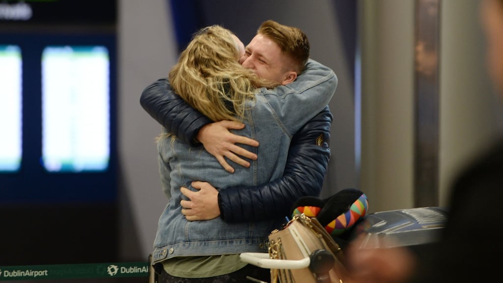 David Donnelly greeting his sister Abigail on her arrival at Dublin Airport in time for Christmas 2019. Photograph: Alan Betson