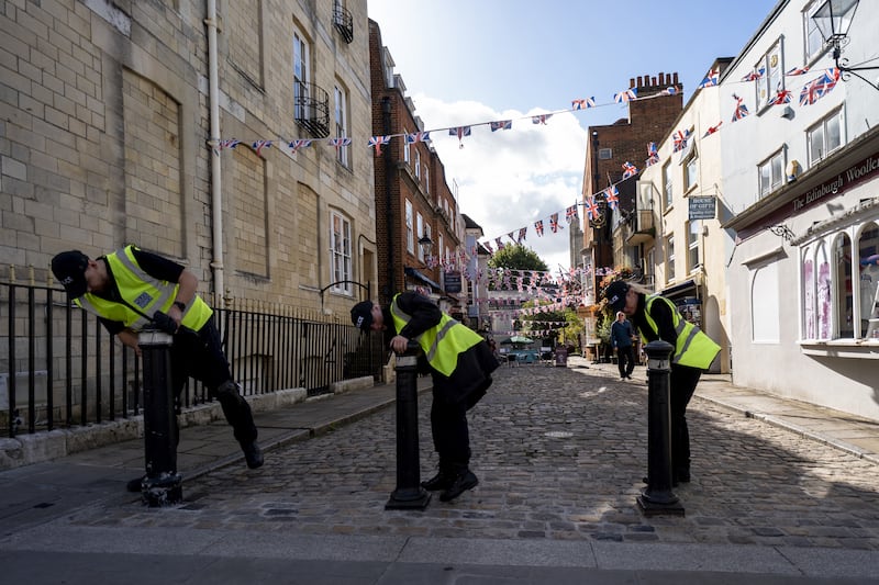 British police carry out security searches outside of Windsor Castle ahead the Trump visit. Photograph: Jordan Pettitt/AFP via Getty Images