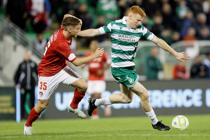 Shamrock Rovers' Rory Gaffney and Serginho of Santa Clara. Photograph: Laszlo Geczo/Inpho