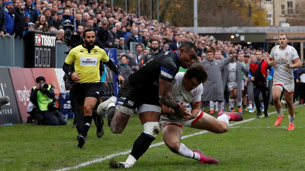 Ulster’s Robbie Stockdale makes a try -saving interception to deny Bath’s Semesa Rokoduguni and clinch victory for the visitors during the Pool Three clash at the Recreation Ground. Photograph: Paul Childs/Reuters