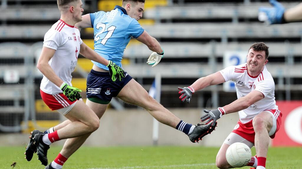 Sean Lowry scores a point during Dublin’s win over Tyrone in Cavan. Photograph: Laszlo Geczo/Inpho