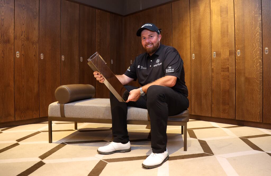 Shane Lowry poses with the BMW PGA Championship trophy. Photograph: Andrew Redington/Getty Images