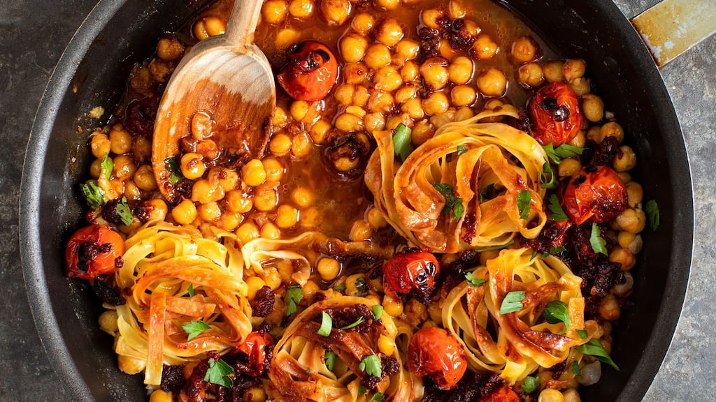 Fried tagliatelle with chickpeas and smoky tomatoes. Photographs: Andrew Scrivani/The New York Times