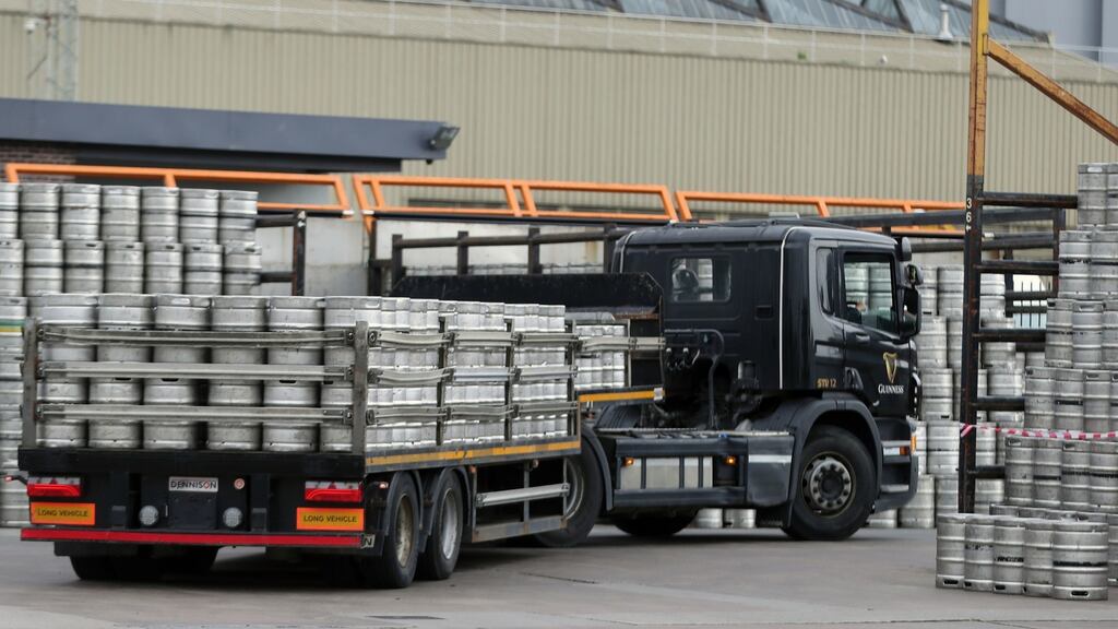 A truck filled with kegs departs the St James’s Gate Guinness brewery in Dublin as production ramps up in preparation for bars re-opening in the UK and Ireland. Photograph: Niall Carson/PA Wire
