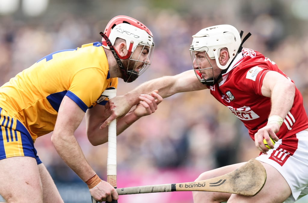 Clare's Conor Leen squares up with Patrick Horgan of Cork during their Munster SHC game in Ennis. Photograph: Tom Maher/Inpho