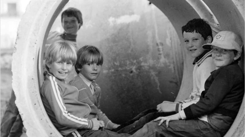 Children playing during the installation of the Council’s drainage scheme 1982