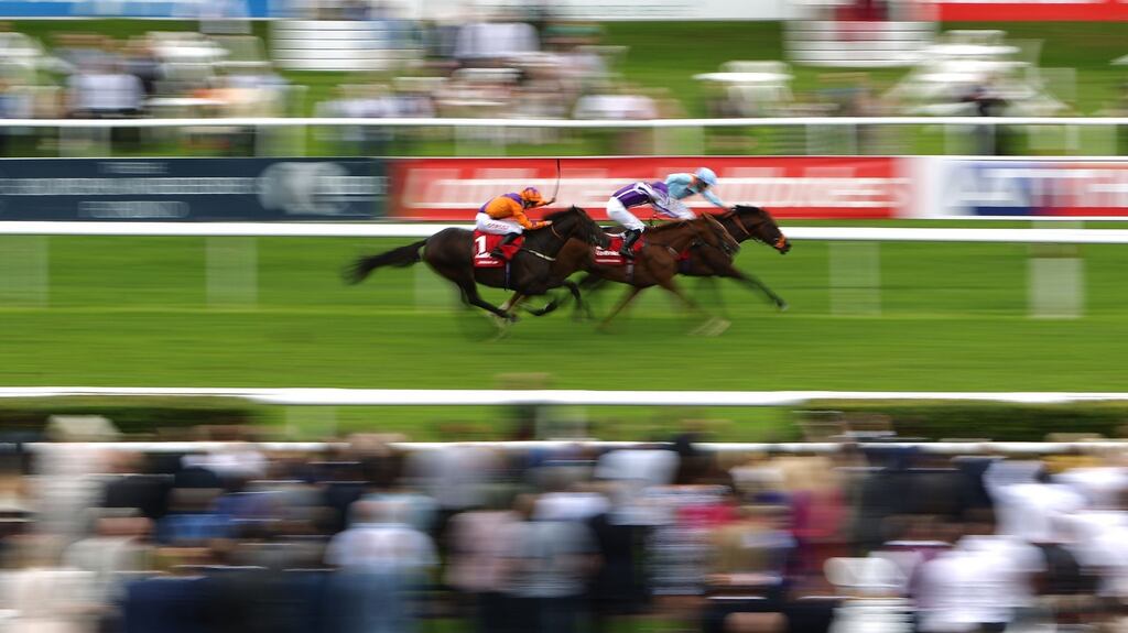 Harbour Law (left) ridden by George Baker comes from behind to win Ladbrokes St Leger Stakes at Doncaster. Photograph: Daniel Smith/Getty Images
