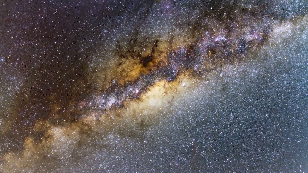 The Central Milky Way seen from Mangrove Mountain, New South Wales. The image show the centre of
our galaxy which is rich in bright nebulosity as well dark obscuring clouds of dust and gas which show up as dark lanes in a sea of stars.
Photograph: John O'Mahony