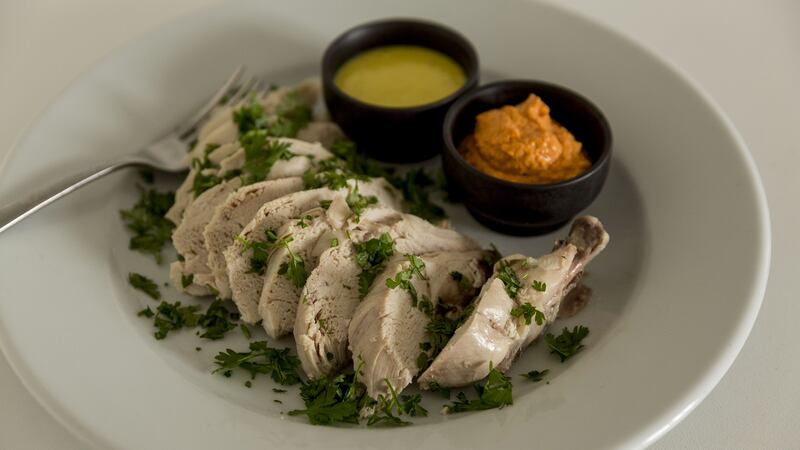 Poached chicken with spicy red pepper mayonnaise: Photograph: Emma Jervis