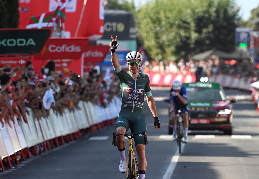 Wout van Aert celebrates winning his third stage of this year's Vuelta a Espana on stage 10 from Ponteareas to Baiona. Photograph: Miguel Riopa/AFP via Getty Images
