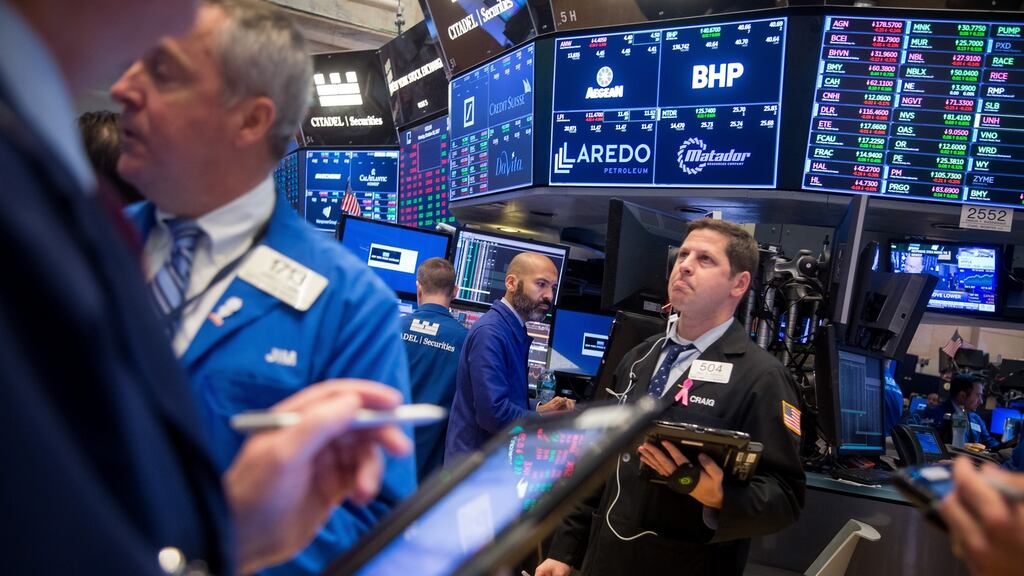Traders work on the floor of the NYSE. Photograph: Michael Nagle/Bloomberg