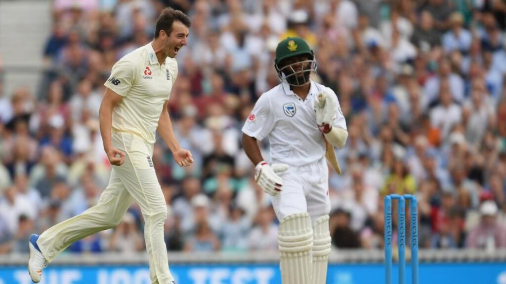 England bowler Toby Roland-Jones  celebrates after dismissing Temba Bavuma of South Africa to complete a five-wicket haul on debut during day three of the third Test  at The  Oval. Photograph: Mike Hewitt/Getty Images