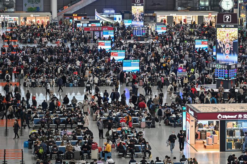 Passengers wait for their trains at Hongqiao railway station in Shanghai on January 11th, as annual migration begins with people heading back to their hometowns for Lunar New Year celebrations. Photograph: Hector Retamal/AFP via Getty