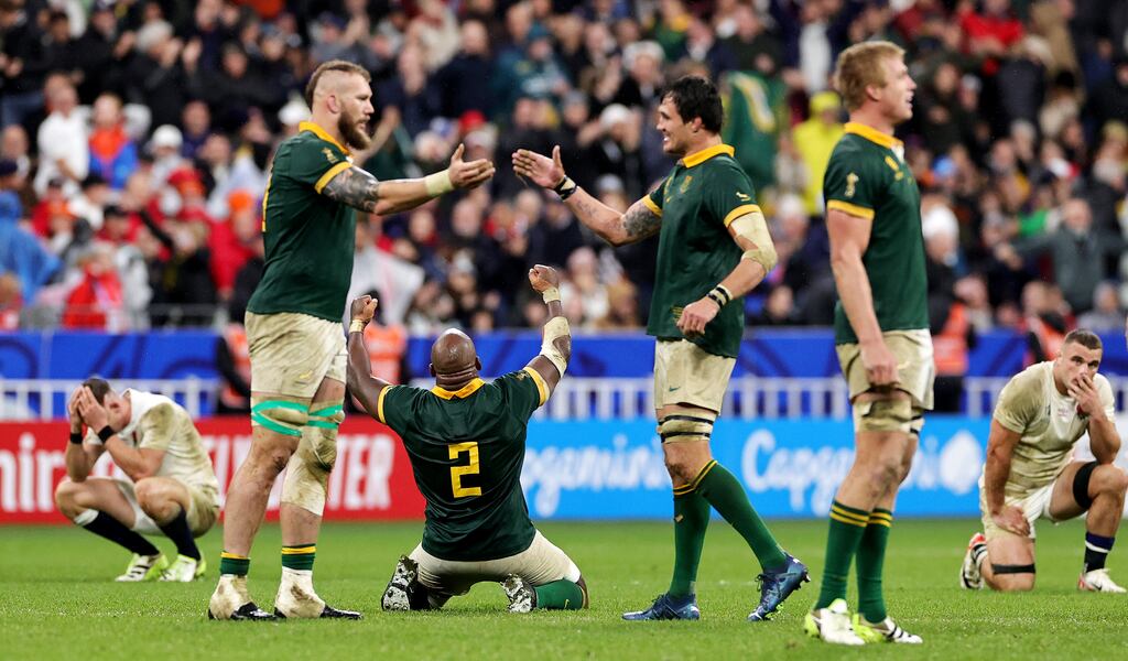 South Africa players celebrate at full-time after the victory over England in the Rugby World Cup final at Stade de France. Photograph: David Rogers/Getty Images