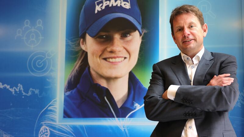 Seamus Hand, with a poster of Irish golfer and KPMG ambassador Leona Maguire: ‘We have talked to Leona about potentially attracting a tournament... that is something that we’d love to support.’ Photograph: Dara Mac Dónaill