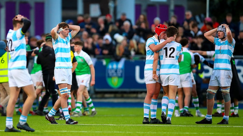 Blackrock dejected at the final whistle. Photograph: Tommy Dickson/Inpho