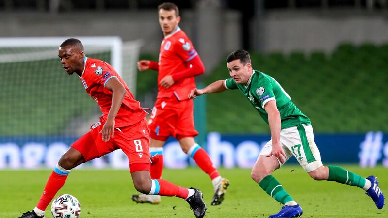 Josh Cullen chases Christopher Martins. Photo: Ryan Byrne/Inpho