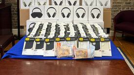 Gardaí seize counterfeit luxury goods and cash in Dublin city centre and suburb
