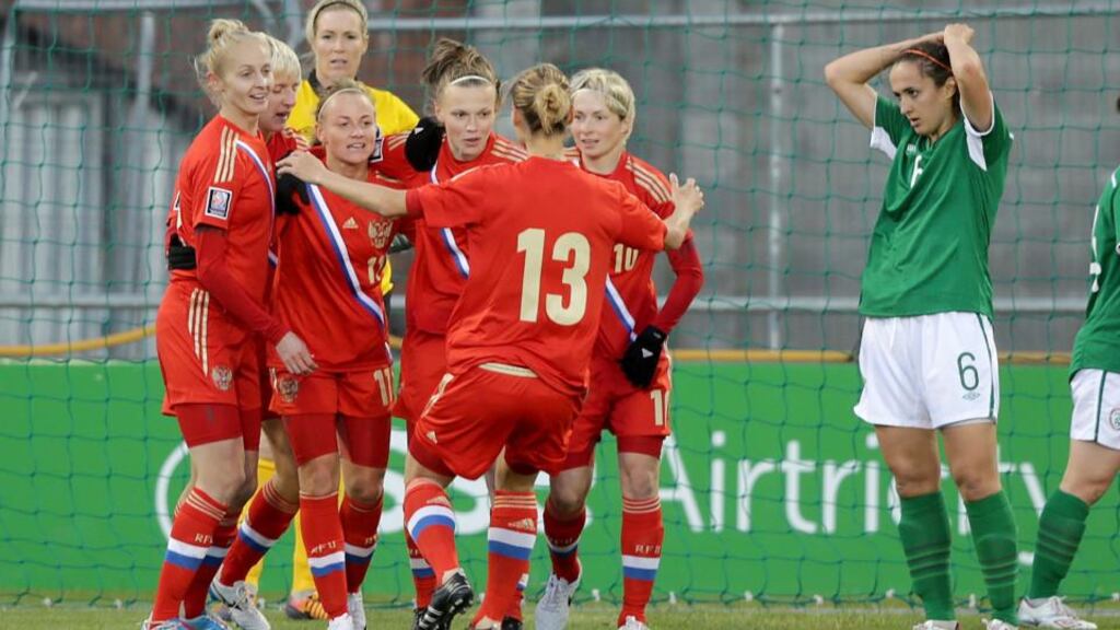 Russian team-mates congratulate goalscorer Ekaterina Pantyukhina as Ireland goalkeeper Emma Byrne (back) and defender Dora Gorman look on during the 2015 FIFA Women’s World Cup Qualifier at Tallaght Stadium. Photograph: Morgan Treacy/Inpho