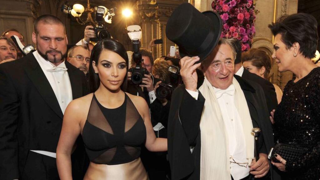 US television personality Kim Kardashian (left), her mother Kris Jenner (right) and their host, 81-year-old Austrian businessman Richard Lugner (centre) arrive for the Vienna Opera Ball at the State Opera in Vienna. Photograph: EPA/Herbert Pfarrhofer