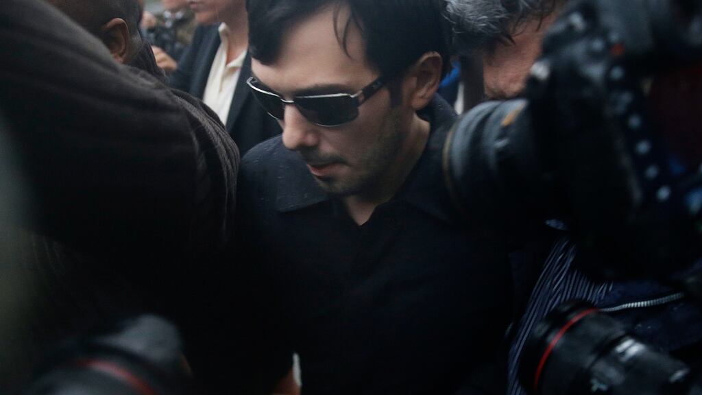 Martin Shkreli leaves the courthouse after his arraignment in New York, Thursday.