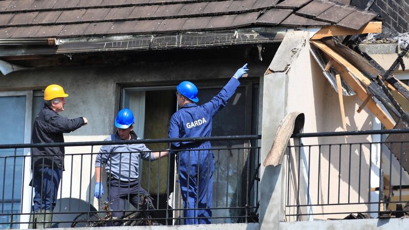 Gardaí and members of Dublin Fire Brigade at the scene of the 2017 fire at the Verdemont apartment complex in Blanchardstown. Photograph: Collins