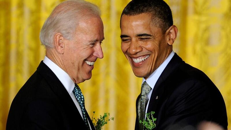 US president Barack Obama and vice-president Joe Biden shake hands on arriving at a reception for Taoiseach Enda Kenny in the White House. Photograph: Mike Theiler/Bloomberg