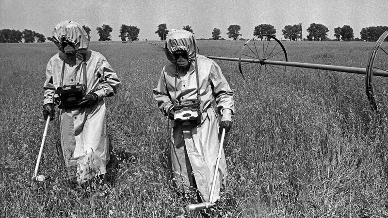 Chernobyl: in the 30km off-limit zone, liquidators measure radiation levels in the aftermath of the disaster. Photograph: Getty