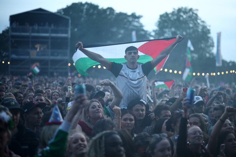 Kneecap: Festivalgoers hold Palestine flags during Wide Awake Festival 2025 in London. Photograph: Henry Nicholls/AFP/Getty Images