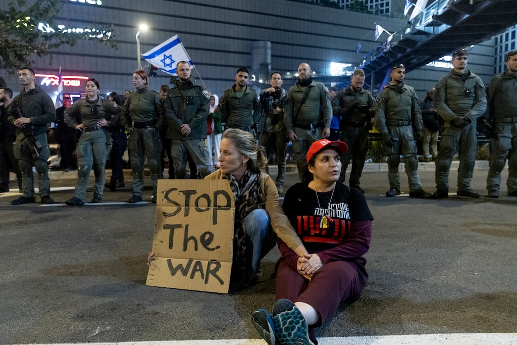 Police officers and protesters on Sunday in Tel Aviv, Israel, during a demonstration calling for a deal for the release of hostages held in the Gaza Strip by Hamas. Photograph: Amir Levy/Getty Images