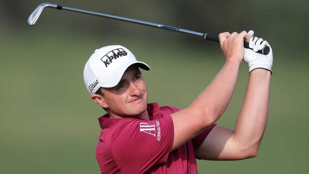 Paul Dunne of Ireland plays a shot during the Qatar Masters golf tournament at the Doha Golf Club. Photograph: Getty Images