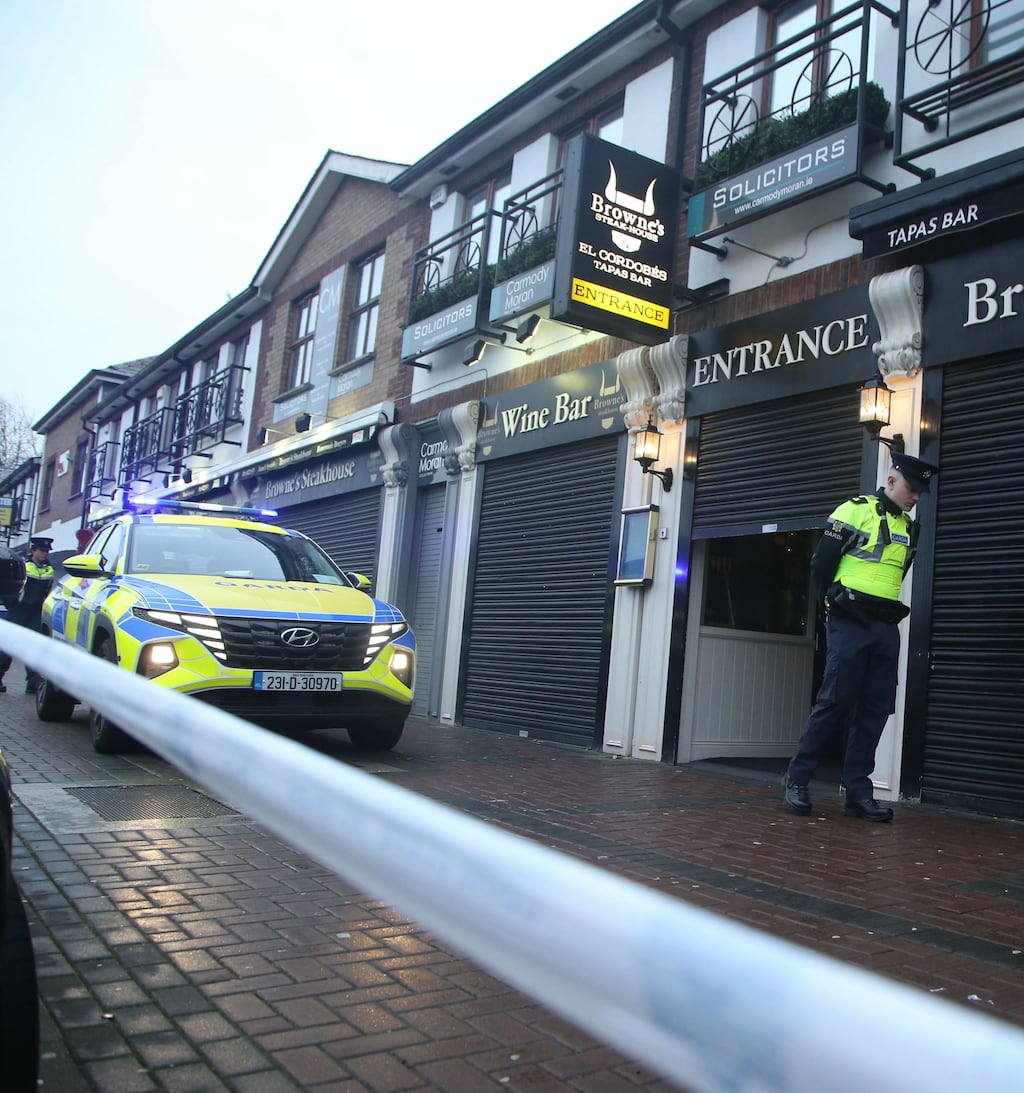 Gardaí outside Browne's Steakhouse in Blanchardstown, Dublin after the shooting of Jason Hennessy snr and fatal beating of Tristan Sherry last December. Photograph: Stephen Collins/Collins