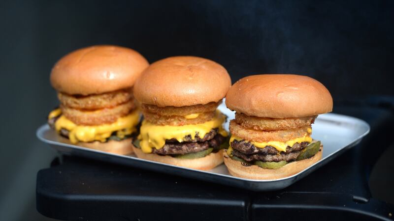 Ultimate beef burger with crispy onion rings and rarebit cheese sauce. Photograph: Dara Mac Dónaill/The Irish Times